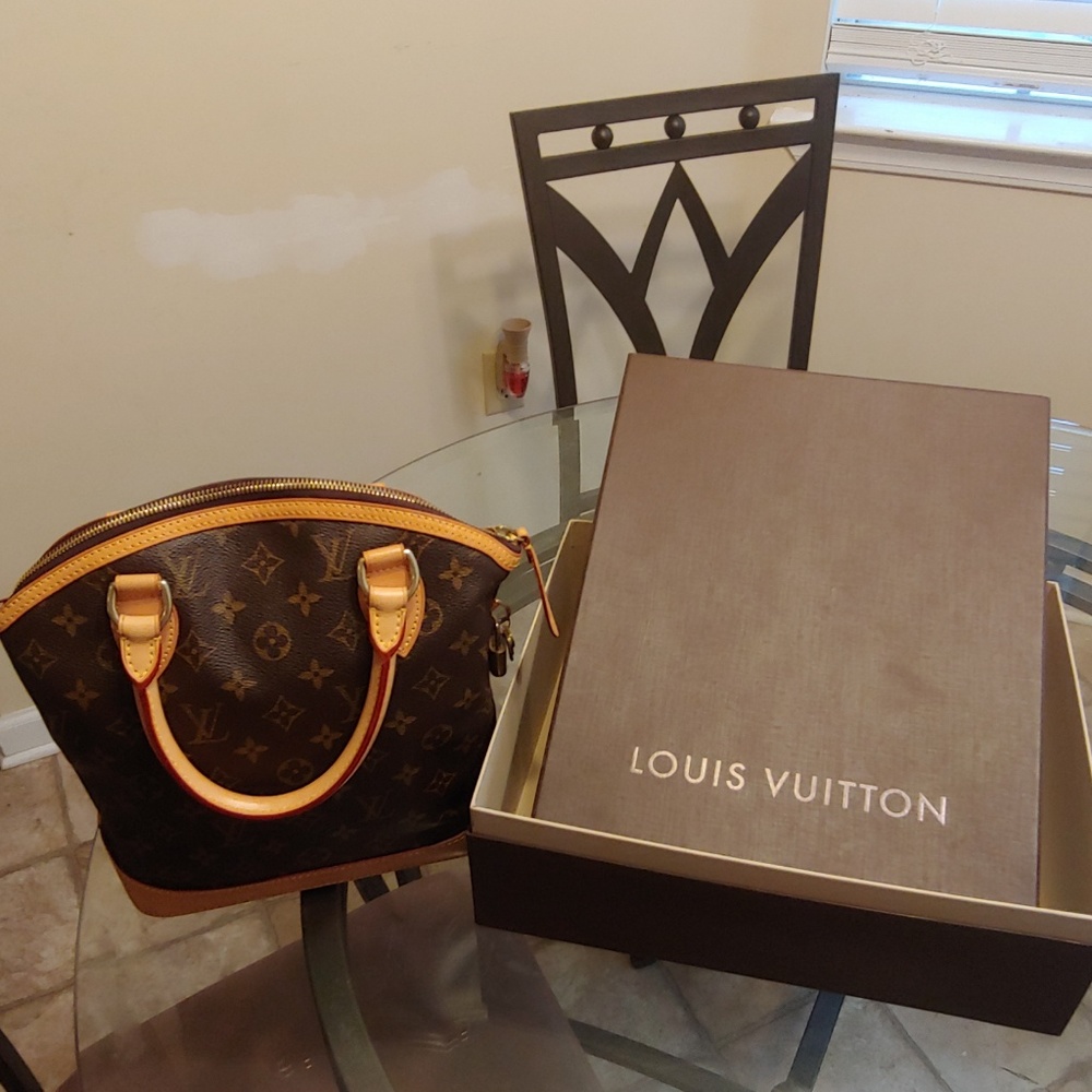 Authentic Louis Vuitton Lock it Handbag